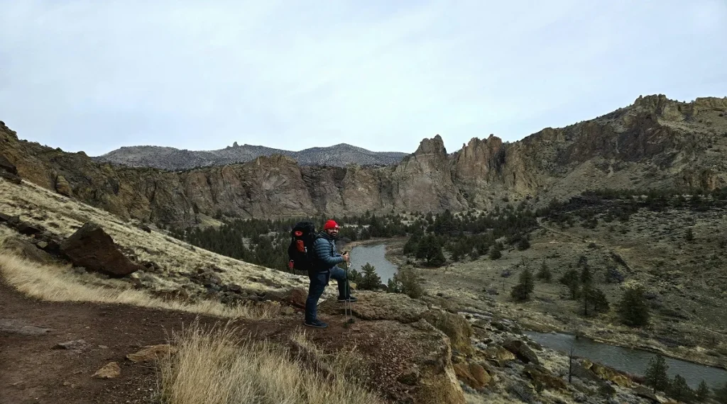 packing a light extra layer helps hikers stay comfortable during cool trail breaks