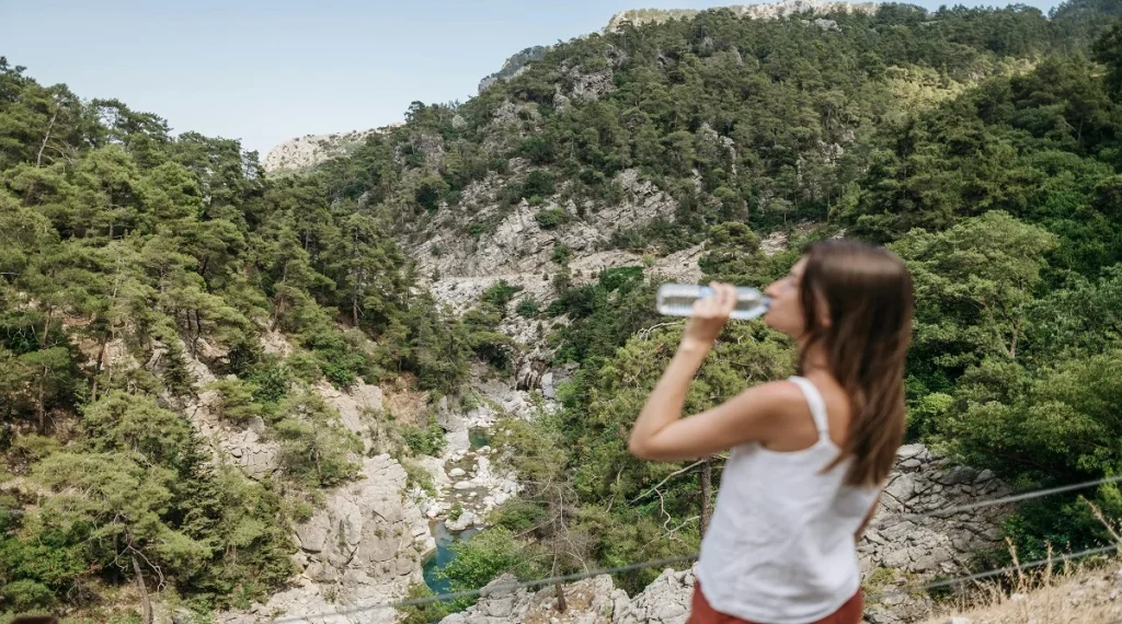 small hiking mistakes often include waiting too long to drink water on the trail