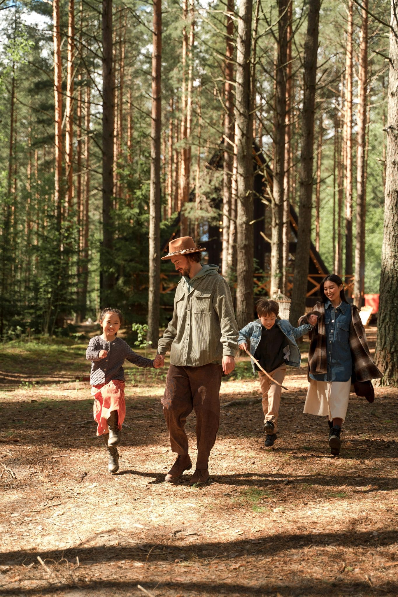 pacing a family hike on a wooded trail with children walking comfortably
