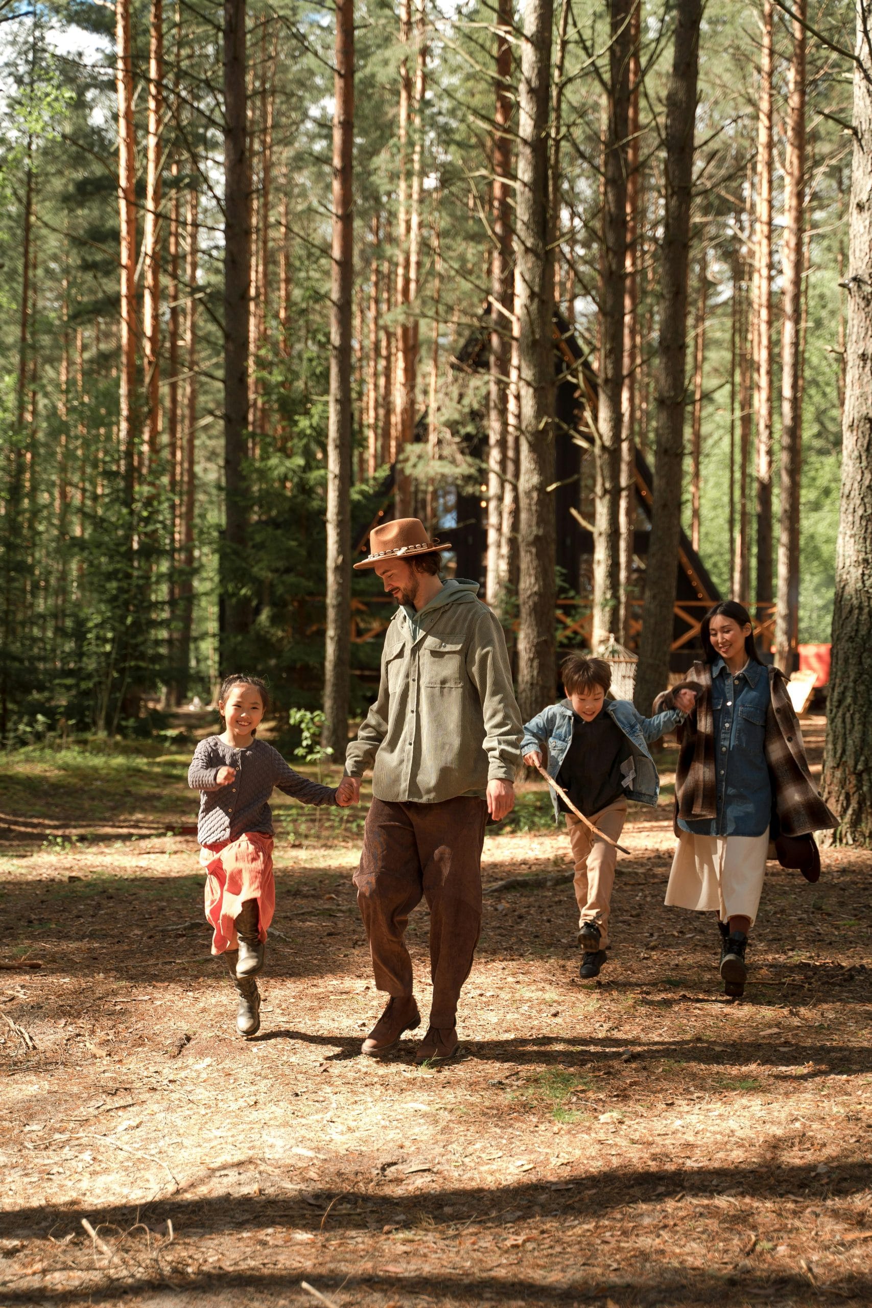 pacing a family hike on a wooded trail with children walking comfortably