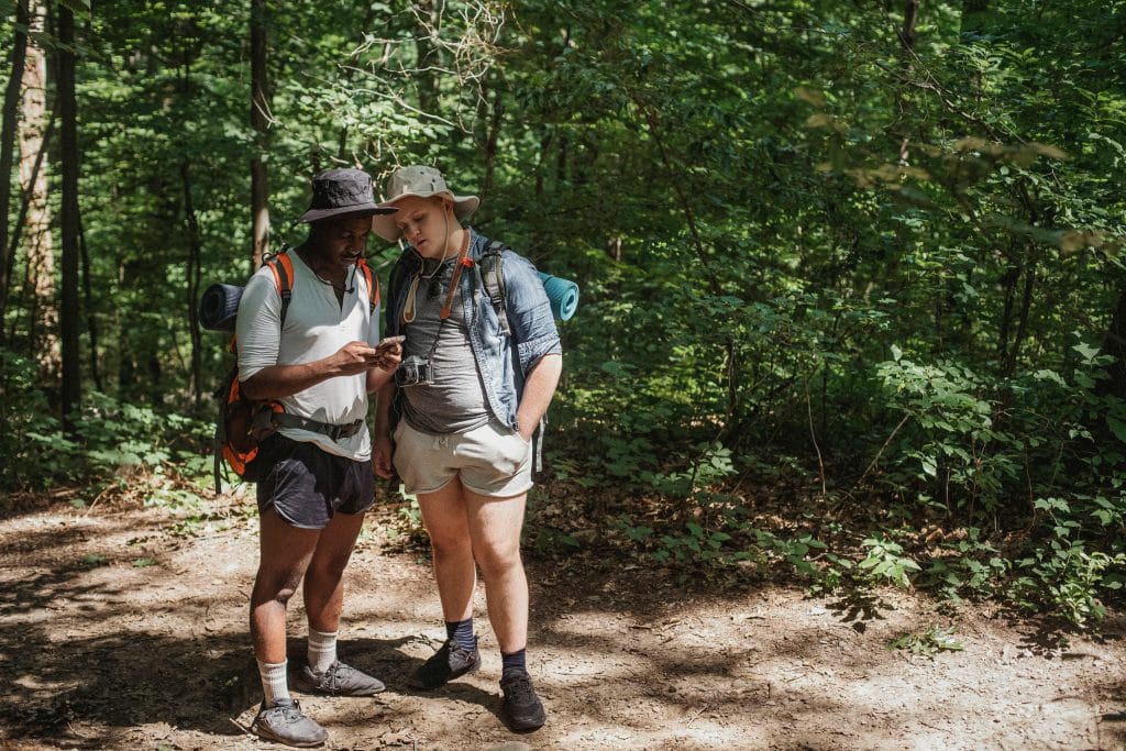 hiking etiquette rules include polite communication between hikers