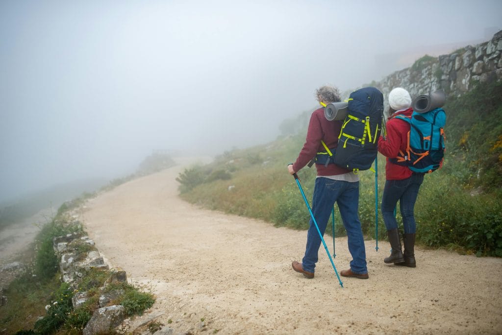 weather changes during a hike leading to turning back on a trail