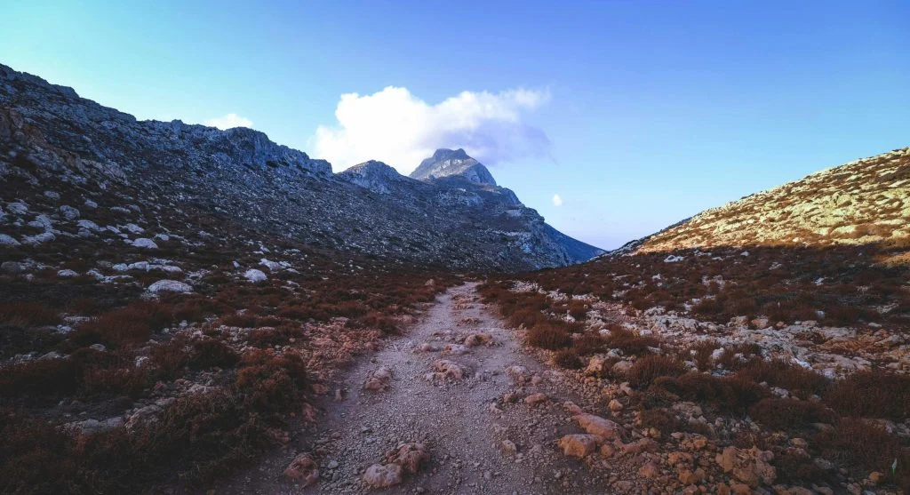hikers on exposed trail section