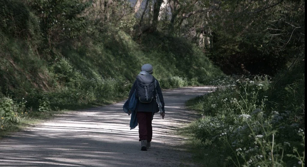 hiker on uneven trail with steady pace