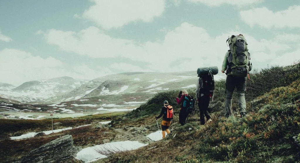 hiker looking back on shared route