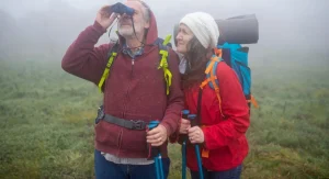 hiker in extra layer on trail