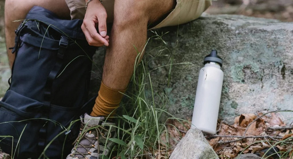 Hiker taking a break on a warm spring afternoon