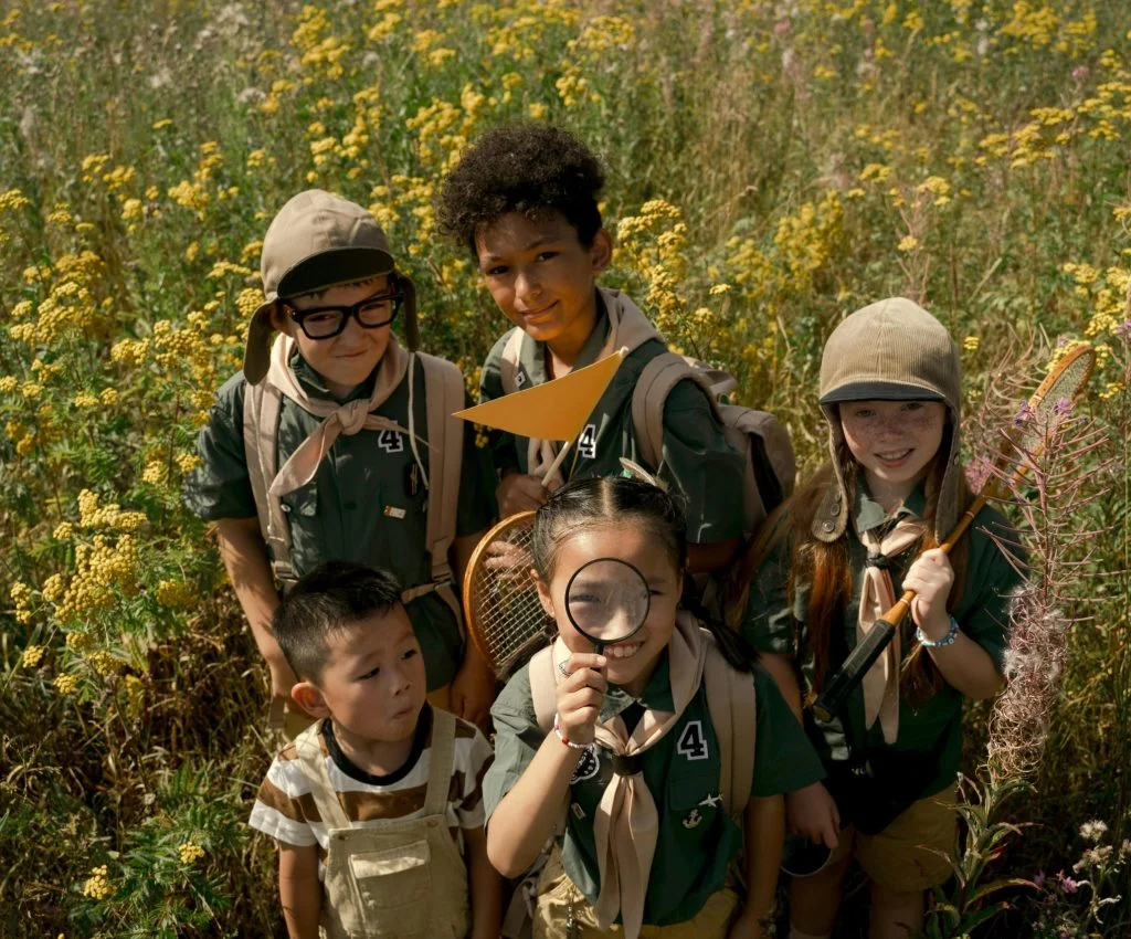 Kids on a nature trail, exploring small details