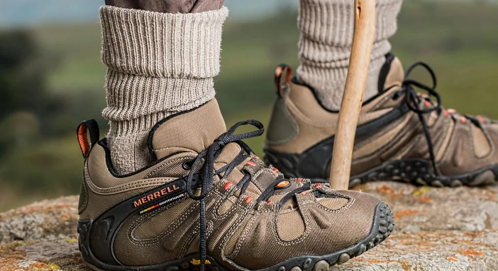 A hiker's feet with socks and boots, highlighting potential irritations
