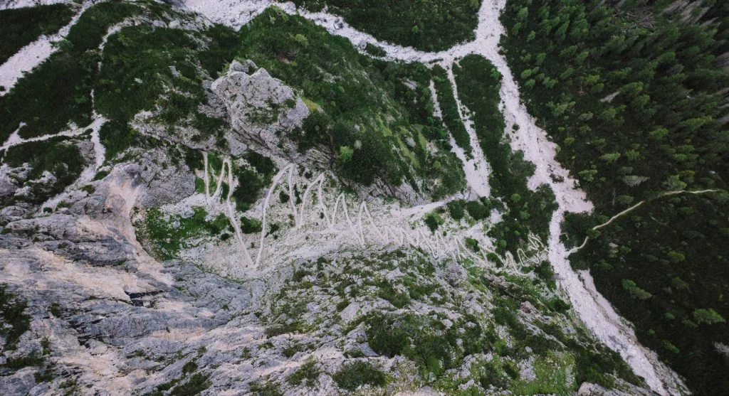 Trail edges often look usable even when the firmer main tread has shifted inward