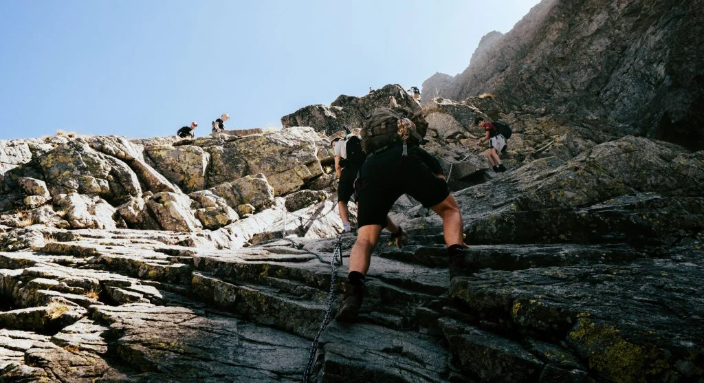 A trail is tilting sideways and requires more balanced controlled steps from hikers