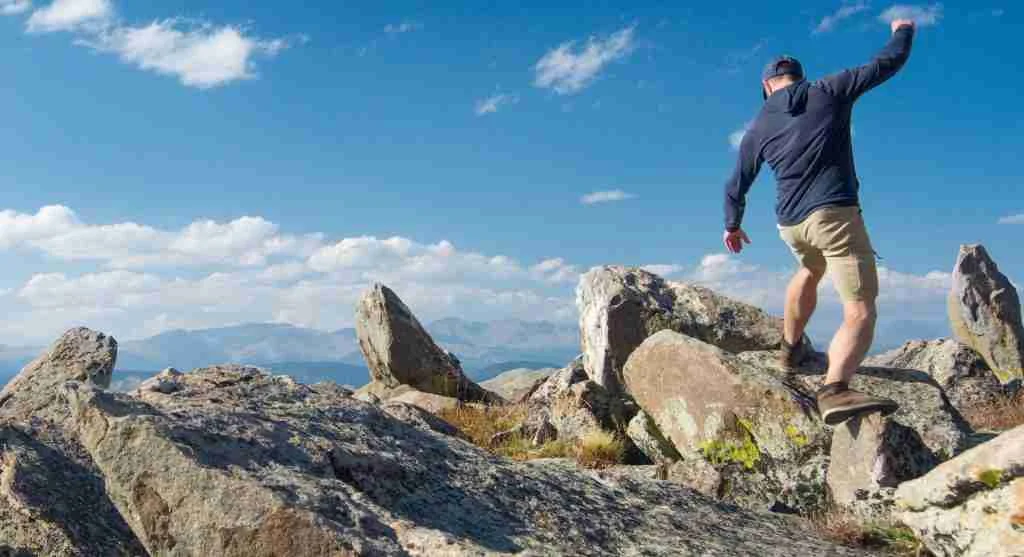 Scattered rocks on a trail often break hiking rhythm and reduce movement efficiency