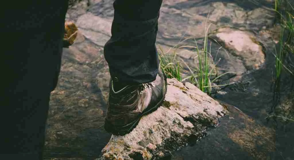 Careful shorter steps help hikers after leaving boardwalk sections on wet trails